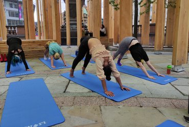 Yoga4Leeds yoga practice at Leeds2023 in City Square at Making a Stand